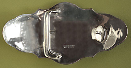 Le dos de cette boucle de ceinture américaine en argent et bronze est signé crumrine usa