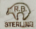 R.B. inside a Bear mark For Running Bear shop