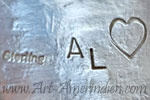AL and heart symbol mark is Albert Lee Navajo earlier hallmark used in 1994-99