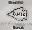 C. MTZ inside arrow head picto and Navajo hallmark is Calvin Martinez mark on jewelry