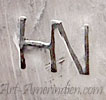 HN conjoined mark on jewelry is Hoskie Nez Navajo silversmith hallmark