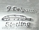 J Delgarito and feather mark on Indian jewelry is Jereme Delgarito Navajo, brother of Jeremy