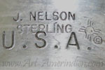 J. Nelson USA hallmark is John Nelson Navajo signature