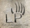 LP under Bear claws mark on jewelry is Lambert Poseyesva Hopi silversmith signature