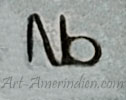 Nb conjoined letters mark is Norbert Becenti Navajo
