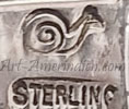 snail mark on Indian Native American jewelry for Bobby Etsitty Navajo