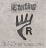 R and bear foot hallmark on jewelry for Benny Ramone Navajo silversmith