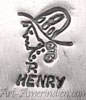 R henry under a head is Ronnie Henry Navajo hallmark, son of George Henry Jr and Nusie Belon