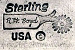 R.H. Boyd inside a spur and USA copyrighted hallmark