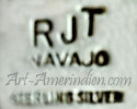 RJT NAVAJO mark on Indian Native American jewelry is Russell Toledo hallmark