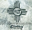 RLT inside a sun symbol hallmark on jewelry is Robert Lewis Tenorio, Kewa