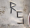 RS chiseled mark on Indian jewelry is Randall Sahmie Hopi silversmith