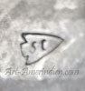 SC arrow head mark