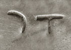 quarter of moon and T is the first Thomas Singer hallmark