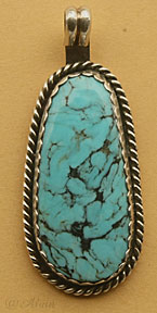 Pendentif amérindien Navajo en argent massif avec turquoise rare Blue Diamond Mine entourée d'une corde en argent