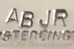 AB JR initials on jewelry is Allen Boy Jr Navajo hallmark