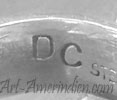 DC mark for Derrick Cadman Navajo silversmith