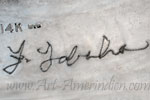 F Tabaha script mark on jewelry is Francis Tabaha Navajo artist signature