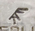 FAT conjoined letters is First American Traders shop from Gallup NM
