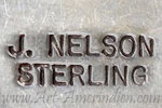 J. NELSON mark on indian native American jewelry is John Nelson Navajo