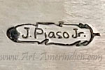 Joe Piaso Jr inside a feather Navajo Indian Native jewelry mark
