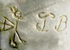 JB and stilised roadrunner hallmark for Johnny Bluejay Hopi Indian Native American silversmith