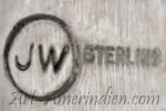 JW inside a circle mark is Jamaes Walter Navajo