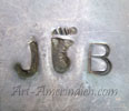 JB and footprint mark