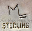 ML with underlined L mark on indian jewelry is Marvin Lucas Hopi silversmith hallmark