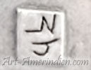 NJ or LNJ hallmark in shadow boxe jewelry