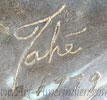 Tahé script mark on jewelry