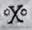 X and 2 sun symbols mark is Xavier Bitsui Navajo signature